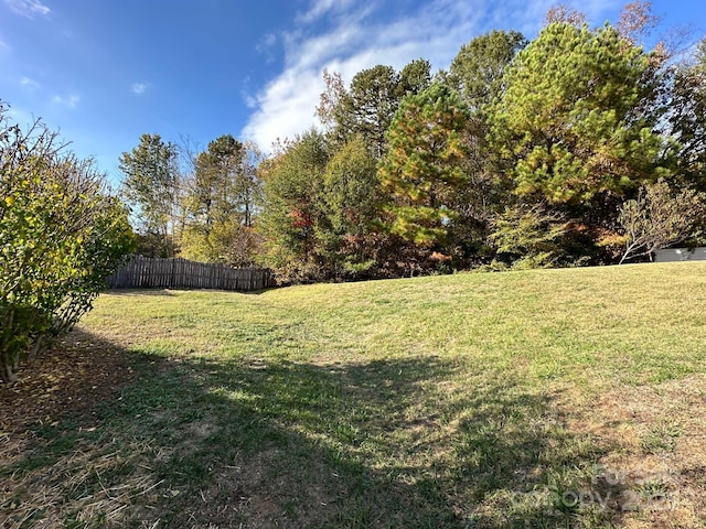 view of yard with fence