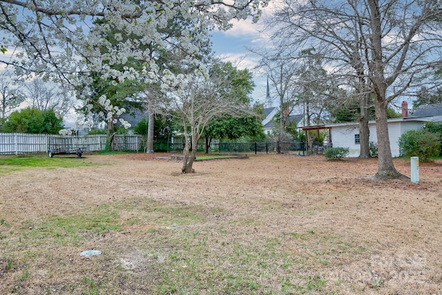 view of yard with fence