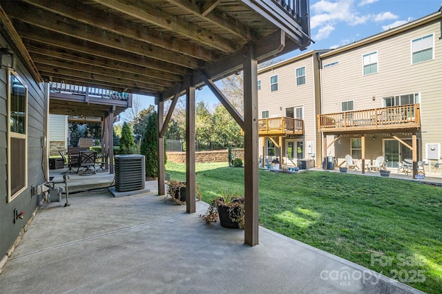 view of patio with fence and cooling unit