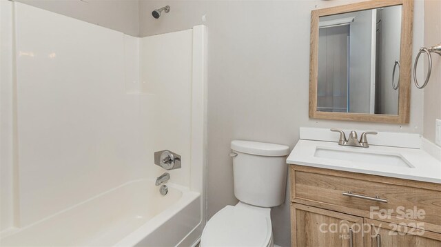 437 Valley St, Stanley, NC 28164 - bathroom featuring toilet, vanity, and washtub / shower combination