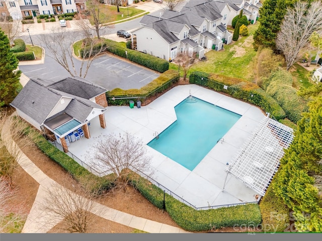 birds eye view of property with a residential view