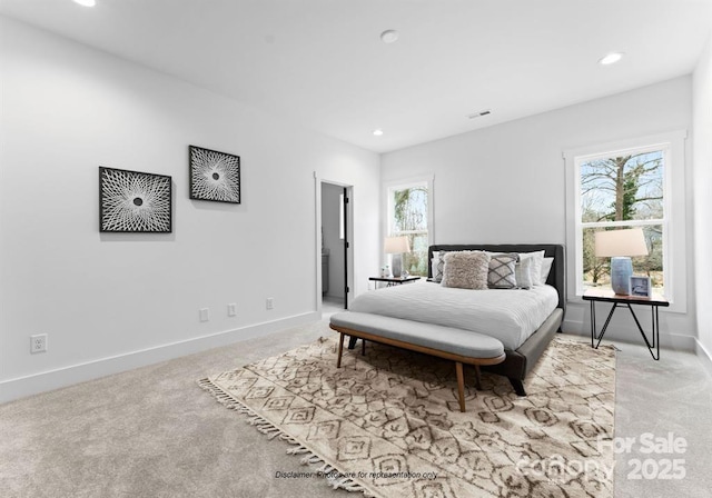 bedroom featuring recessed lighting, multiple windows, light carpet, and baseboards