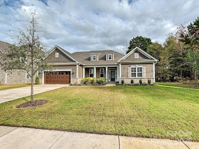 craftsman inspired home featuring stone siding, concrete driveway, board and batten siding, and an attached garage