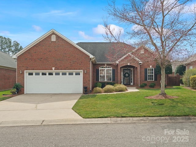 view of front of home featuring driveway, brick siding, an attached garage, and a front yard