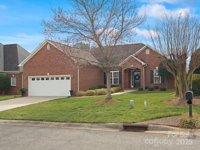 view of front of property with driveway, brick siding, a garage, and a front yard