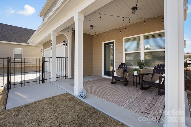view of patio / terrace with fence