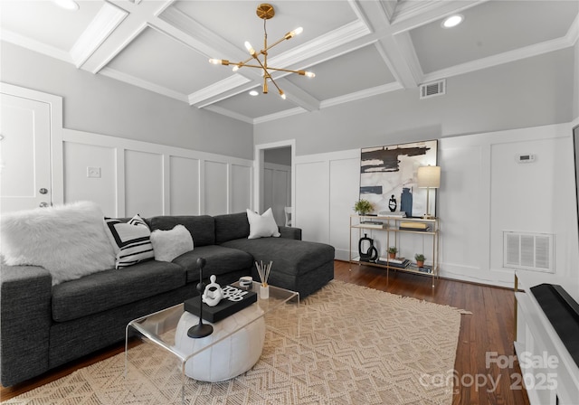 living area with visible vents and a decorative wall