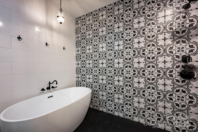 full bathroom featuring a soaking tub and tile walls