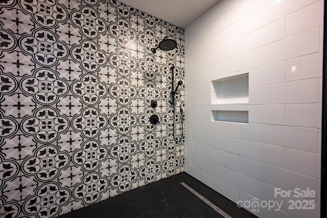 interior space with tiled shower