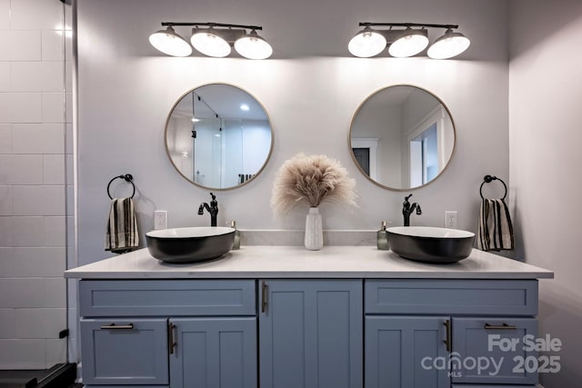 bathroom with double vanity and a sink