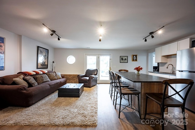 living area with wood finished floors