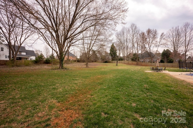 view of yard with fence