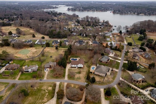 bird's eye view featuring a residential view and a water view