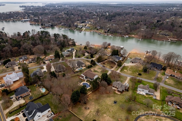 bird's eye view with a water view and a residential view