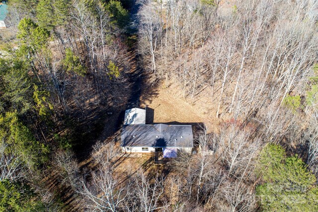 aerial view featuring a view of trees