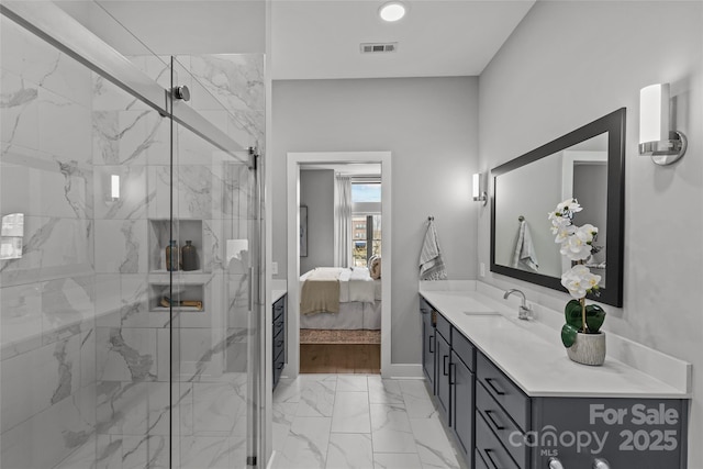 ensuite bathroom featuring marble finish floor, a marble finish shower, connected bathroom, and visible vents