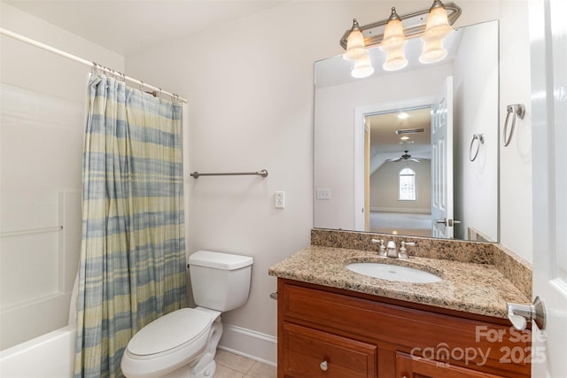 bathroom with shower / bathtub combination with curtain, tile patterned flooring, vanity, and toilet