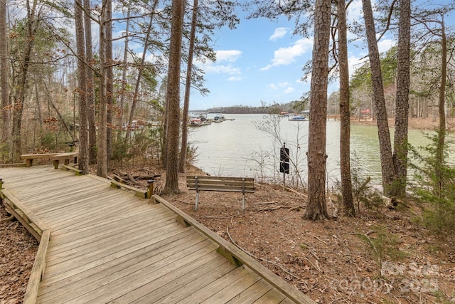 deck featuring a water view