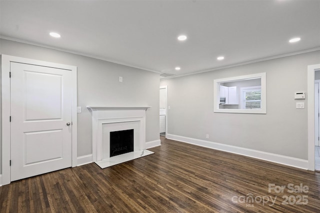 unfurnished living room with dark wood-type flooring, recessed lighting, a fireplace, and baseboards