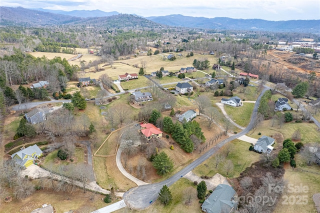 bird's eye view with a mountain view