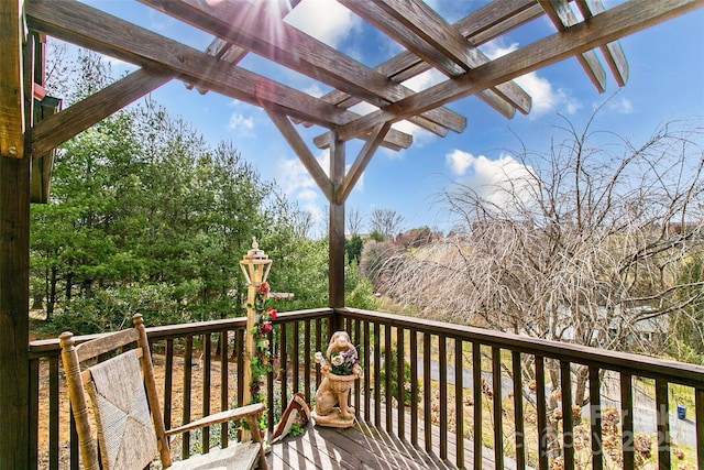 wooden deck with a pergola