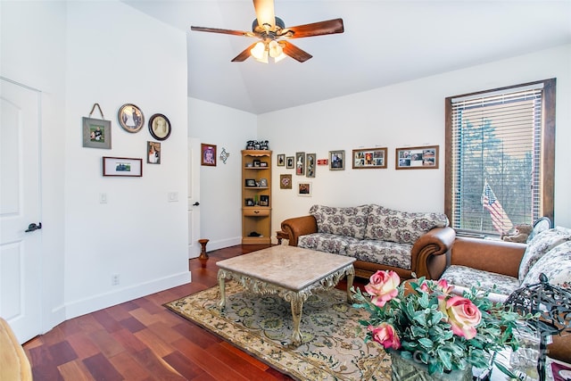 living room featuring a ceiling fan, dark wood-style flooring, vaulted ceiling, and baseboards