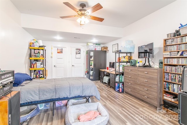 bedroom featuring wood finished floors