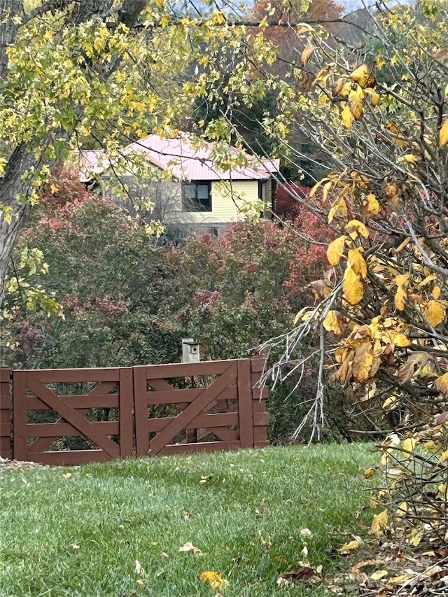 view of gate featuring fence