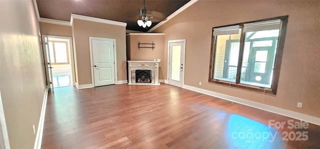 5 N Valley Dr, Weaverville, NC 28787 - unfurnished living room with crown molding, wood finished floors, baseboards, and a fireplace