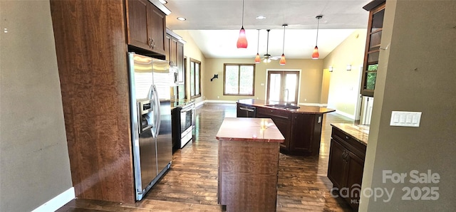 5 N Valley Dr, Weaverville, NC 28787 - kitchen featuring a center island, stainless steel fridge with ice dispenser, dark wood-type flooring, baseboards, and a sink