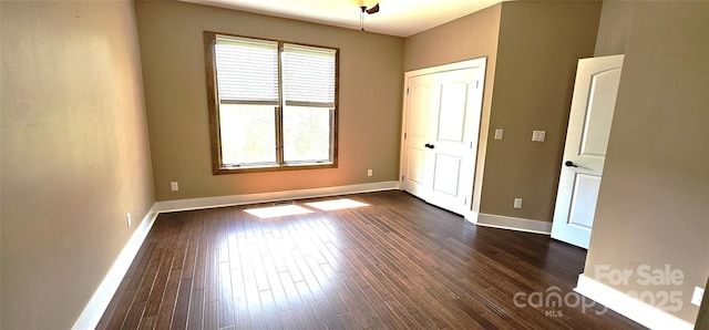 5 N Valley Dr, Weaverville, NC 28787 - unfurnished bedroom with dark wood-style flooring and baseboards