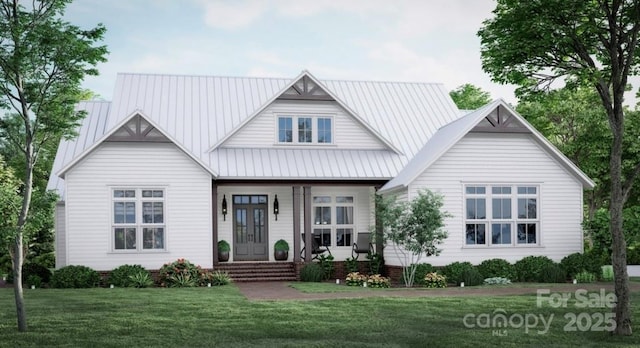 view of front of home with metal roof, french doors, and a front yard