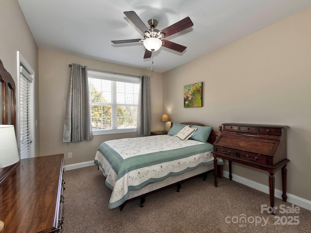 bedroom with carpet floors, ceiling fan, and baseboards