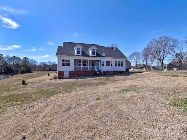 view of front of home with a front yard