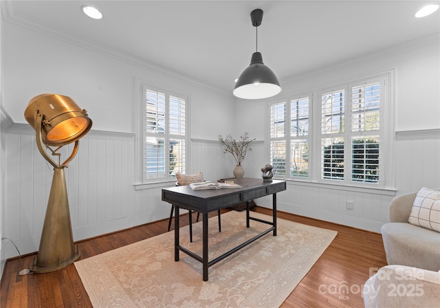 office space with ornamental molding, recessed lighting, a wainscoted wall, and wood finished floors