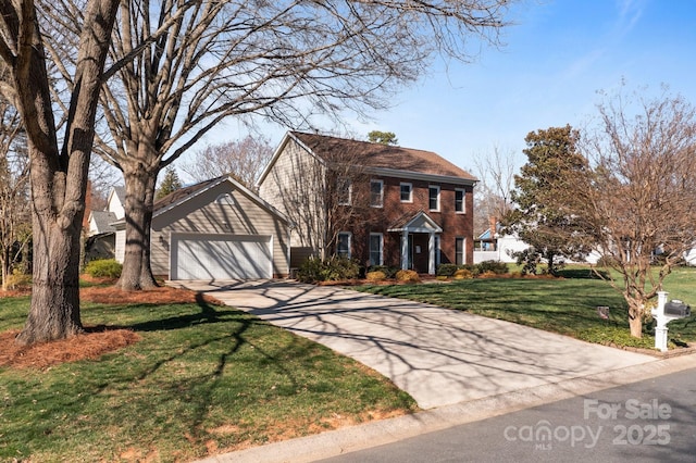 colonial house with a garage, brick siding, driveway, and a front lawn