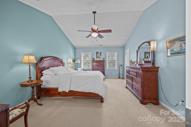 bedroom featuring lofted ceiling, baseboards, a ceiling fan, and light colored carpet