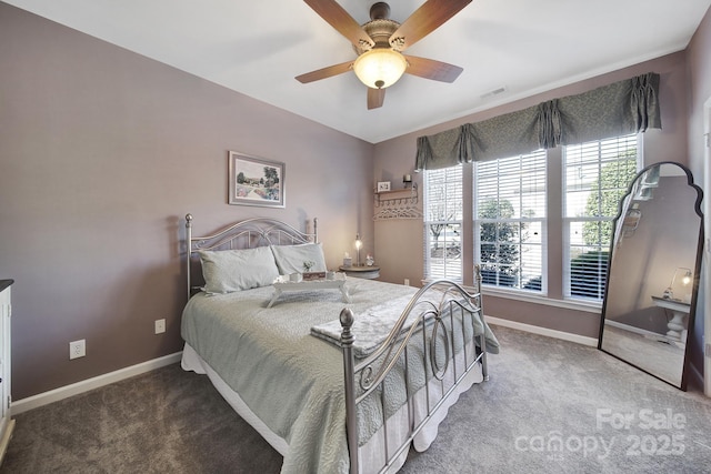 bedroom with baseboards, visible vents, and carpet flooring