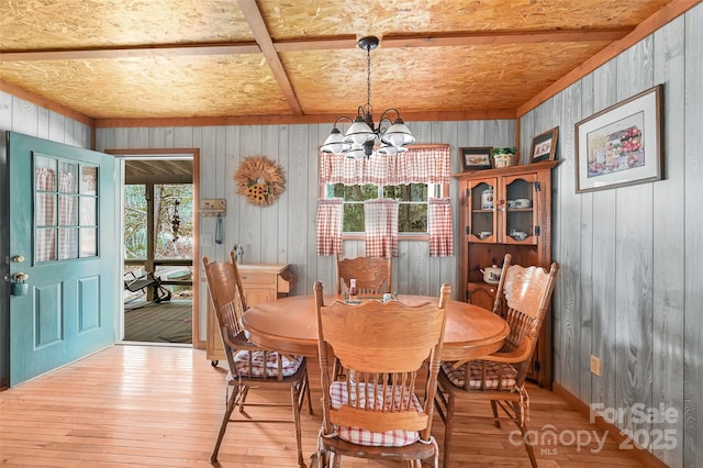 193 Oak Ridge Rd, Hendersonville, NC 28792 - dining room with wood-type flooring and a notable chandelier