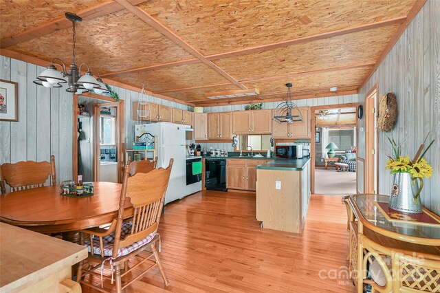 193 Oak Ridge Rd, Hendersonville, NC 28792 - kitchen with black dishwasher, light wood finished floors, light brown cabinetry, freestanding refrigerator, and a sink