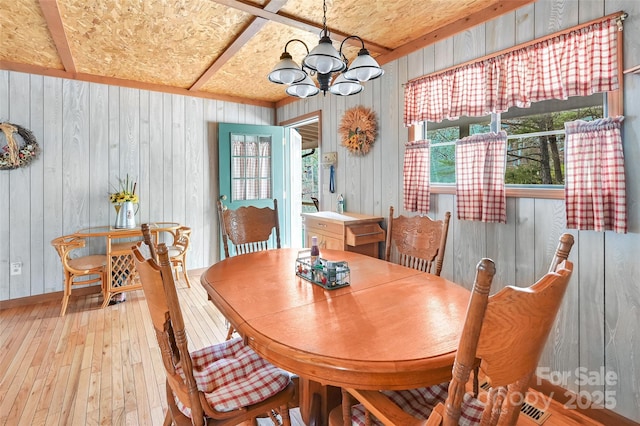 193 Oak Ridge Rd, Hendersonville, NC 28792 - dining area with a chandelier, light wood-style flooring, and baseboards