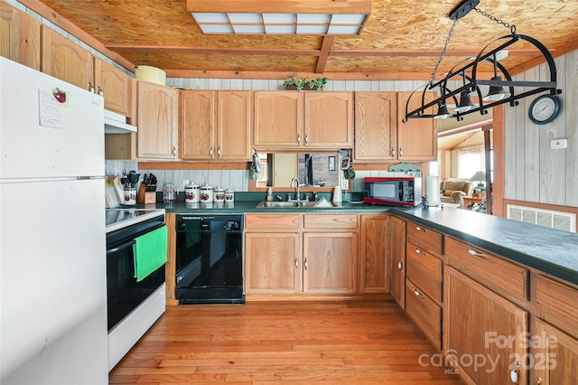 193 Oak Ridge Rd, Hendersonville, NC 28792 - kitchen featuring dark countertops, visible vents, light wood-style flooring, a sink, and white appliances