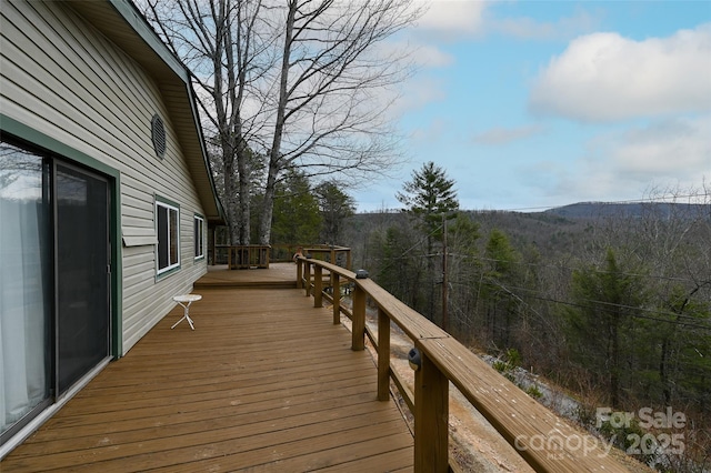193 Oak Ridge Rd, Hendersonville, NC 28792 - wooden terrace with a wooded view