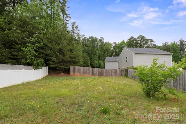 view of yard with fence