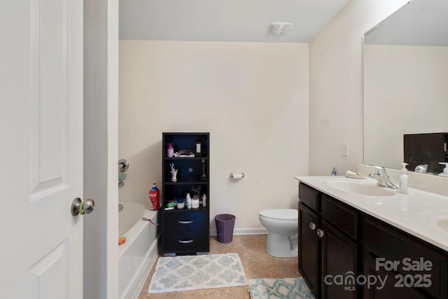 bathroom with toilet, a bathtub, double vanity, tile patterned flooring, and baseboards