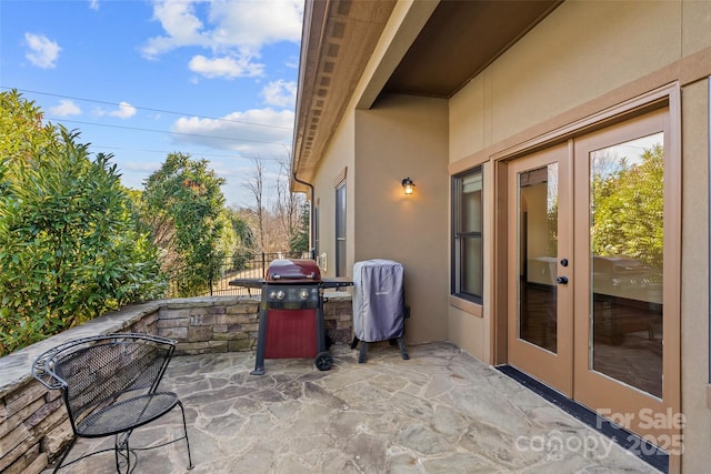 view of patio / terrace with french doors and area for grilling