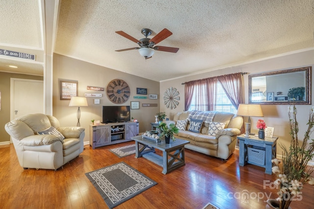 living room featuring baseboards, vaulted ceiling, a textured ceiling, a ceiling fan, and wood-type flooring