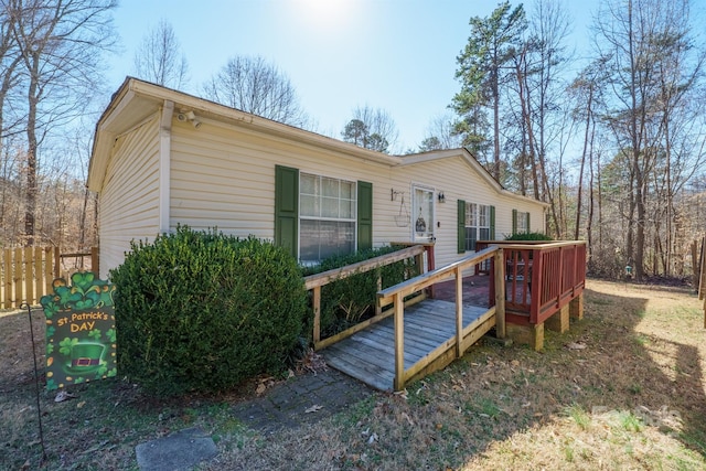 1049 Ramsey St, Stanley, NC 28164 - back of property with a deck and fence