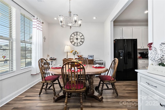 dining room featuring dark wood-style floors, baseboards, a chandelier, and recessed lighting