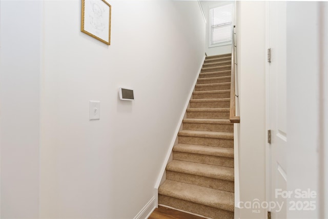 stairway with baseboards